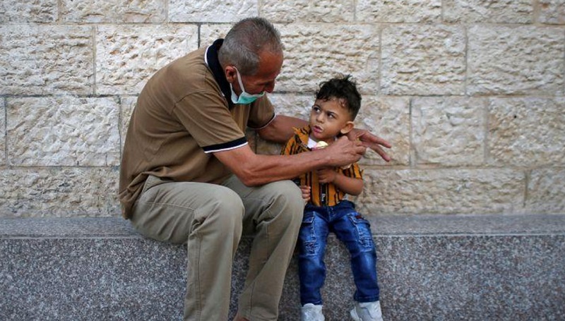 ماسک، راهکار مردم در منطقه شلوغ غزه